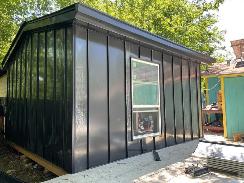 Black standing seam metal wall panels for Roof Inspection in Fort Bliss